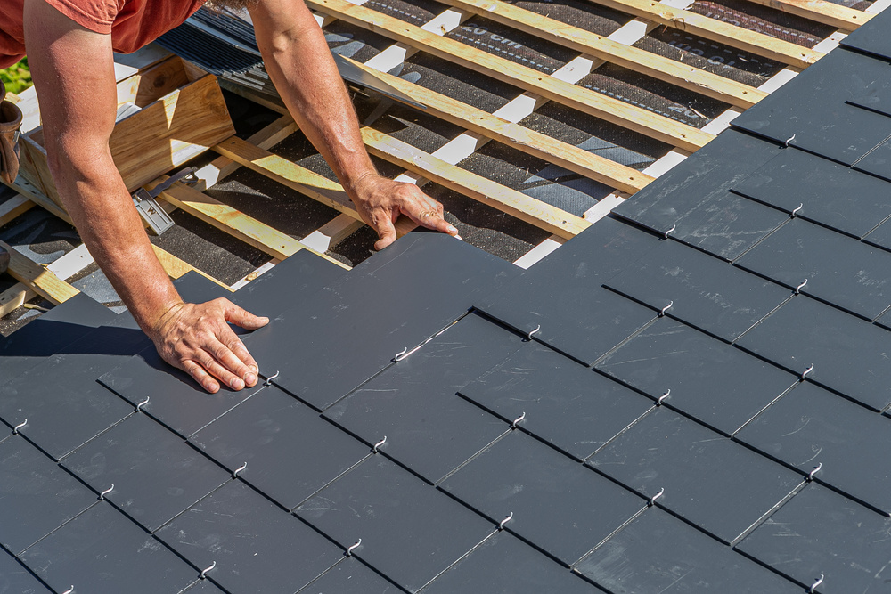 Craftsmen Are Installing A Slate Roof Home Professional Roof Workers Repairing Roof T Working On Rooftop