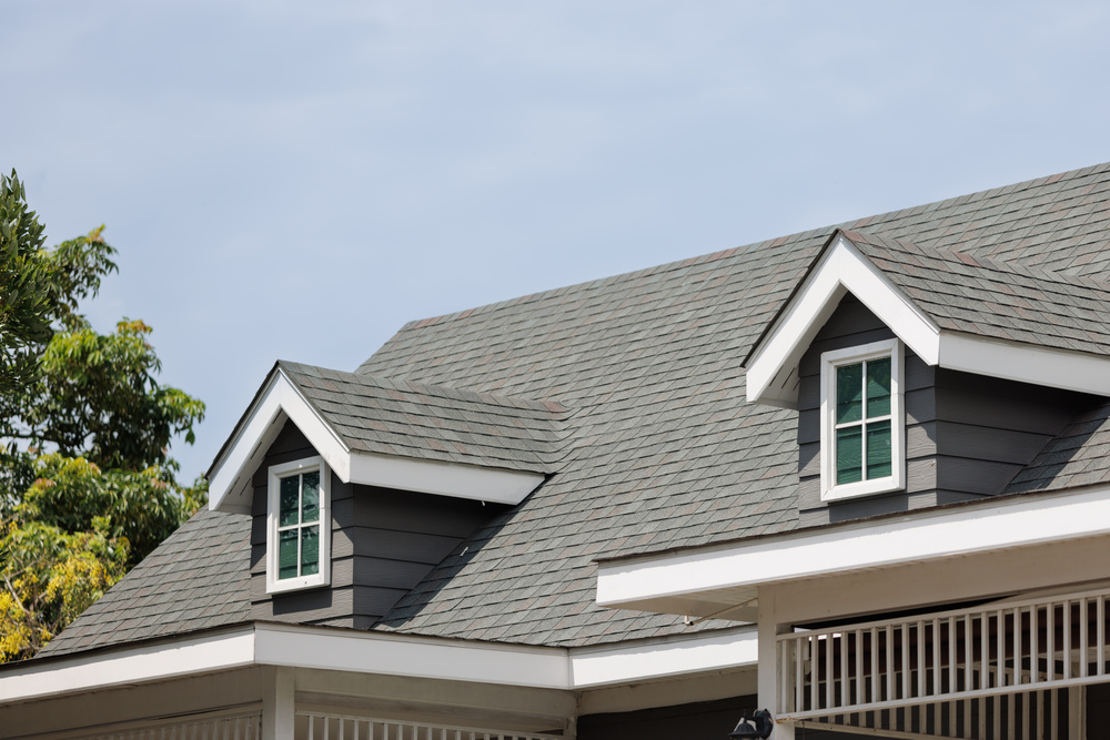 Roof Shingles With Garret House On Top Of The House Dark Asphal